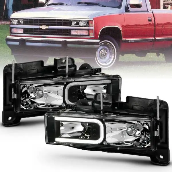 ANZO 1999-2000 Cadillac Escalade Crystal Headlights Light Bar Black Housing (Pair)