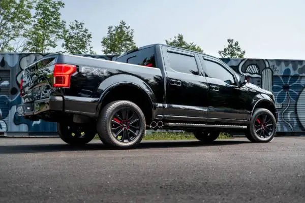 MBRP 15-20 Ford F150 Pre-Axle 4in OD Tips Dual Outlet 3in Black Coated Cat Back Exhaust image 6